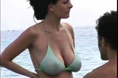 Hot MILF at beach in bikini - drtuber.com